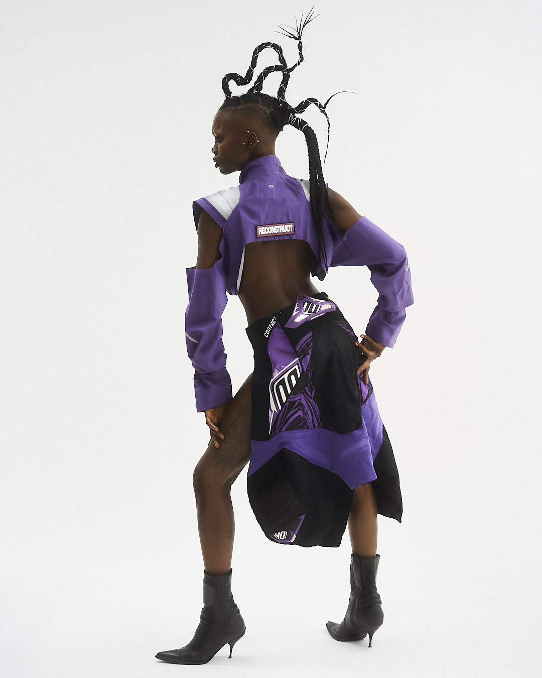 Reconstructed motorpants, black and purple, motor skirt, cropped rainjacket, Reconstruct Collective.