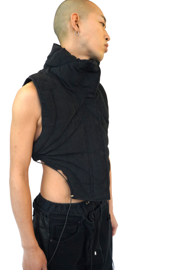 Cropped puffer bodyvest, black, organic stitching, sustainable fashion by Reconstruct Collective.