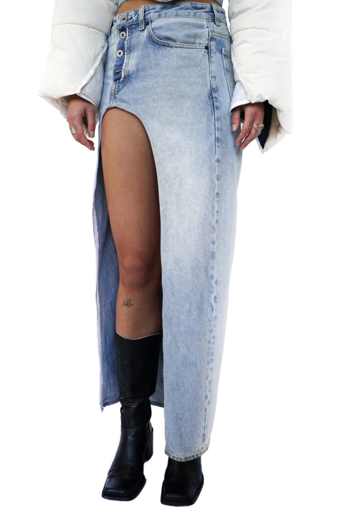 Long denim skirt with high slit, from sustainable fashion brand Reconstruct.
