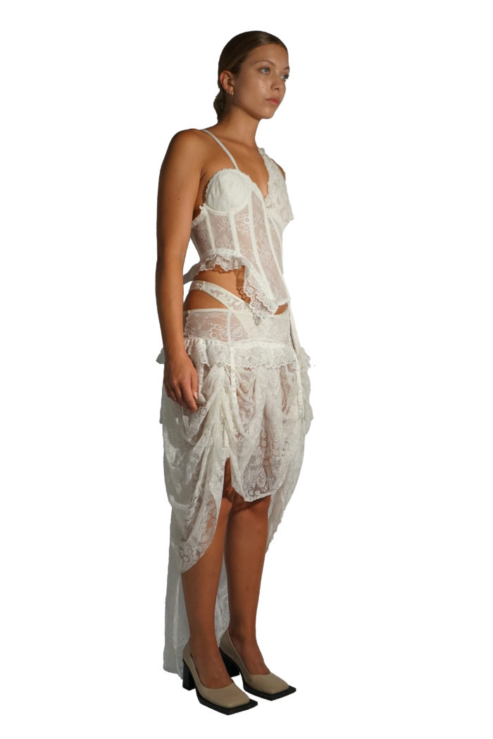 Dreamy white lace skirt, slightly seethrough, made from waste fabrics