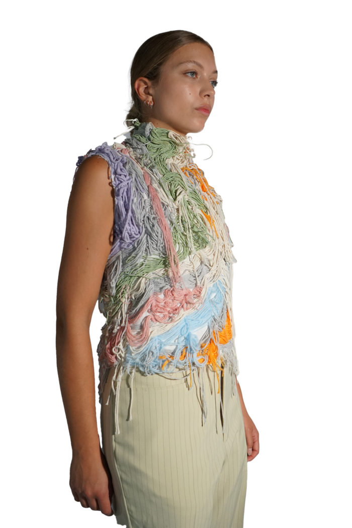 Messy top with a spectrum of pastel colors stitched in an organic way