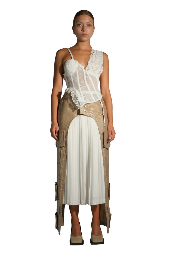 Asymmetric pleated skirt with pockets with white deconstructed lace corset